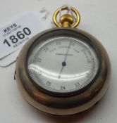 An early 20th Century Gilt Brass Combination Pocket Barometer/Altimeter, the drum-shaped case with