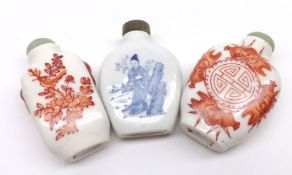 A collection of three Oriental Snuff Bottles, one decorated in underglaze blue and the others in