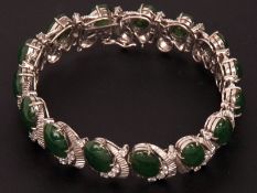 A mid-grade precious metal Green Jadeite Jade and small Brilliant Cut Diamond set Panel Bracelet,