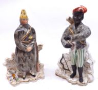 A pair of 19th Century Staffordshire Figures, modelled as Robinson Crusoe and Man Friday,