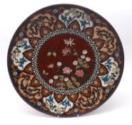 A Cloisonné Circular Plate, the centre decorated with a panel of butterfly and foliage within a