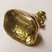 A large Victorian Pinchbeck and Citrine Seal, 4 ½ cm tall