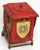 An unusual Toleware style Coal Box of square form, decorated with fleur-de-lys panel of a red