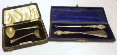A Mixed Lot comprising: a boxed Sheffield hallmarked Babies Spoon and Food Pusher, and a cased set