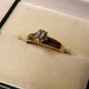 A mid-grade precious small Solitaire Diamond Ring, Brilliant Cut, stamped “14K”