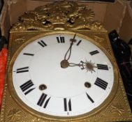 A late 19th Century French Comtoise Wall Clock of typical form with embossed brass mask decorated