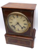 An early 20th Century Walnut and Brass line inlaid Mantel Clock, the plinth shaped case with