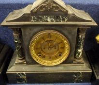 A late 19th Century Black Slate and Green Variegated Marble Mantel Clock, the architectural case