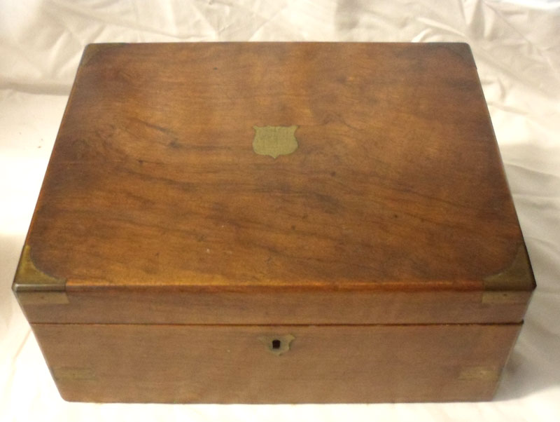 A Victorian Walnut Writing Box with vacant brass nameplate, brass escutcheon, brass bound corners