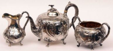 A heavy gauge Victorian Tea Set decorated with floral detail, comprising Teapot, the lid with flower