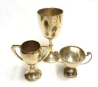 A plain Goblet of typical form, with knopped stem and spreading circular foot, London 1935; together