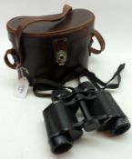 A leather cased pair of Kershaw “The Olympic” Binoculars