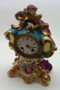 A 1st half of the 19th Century Paris Porcelain Mantel Clock, the waisted case decorated throughout