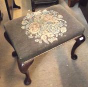 An early 19th Century Mahogany Rectangular Stool raised on cabriole legs and pad feet, 23” wide