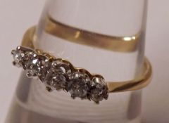 An 18ct Gold and Platinum five small Old Cut Diamond Ring, stamped “18ct & Plat”