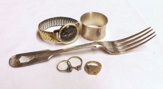 A Mixed Lot comprising: a Victorian Fiddle pattern Table Fork; a modern round Napkin Ring of plain