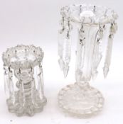 A Victorian Clear Glass Lustre Vase, of tapering form on a shaped circular base fitted with clear