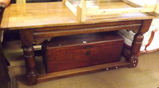 A large 20th Century Rectangular Oak Refectory style Dining Table, on heavy turned baluster legs and