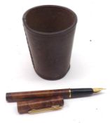 A small stitched Brown Leather Cup together with a `Stypen` fountain pen