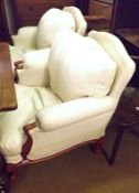 A pair of 20th Century Large Armchairs, upholstered in cream fabric with loose back and seat