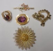 A Mixed Lot: an Amethyst Stone Brooch; a floral bouquet Bar Brooch; a topaz coloured stone Ring in