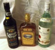 Three Bottles: One Litre Bacardi, Captain Morgans Rum and Isle of Skye Blended Scotch Whisky