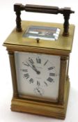An early 20th Century French lacquered Brass repeating Carriage Alarm Clock, the silvered lever