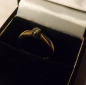 A hallmarked 9ct Gold small Single Stone Diamond Ring