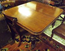 A Victorian Mahogany Pull-Out Extending Dining Table with moulded edge, plain frieze and raised on