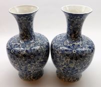 A pair of Wood & Sons Chung pattern wide lipped Baluster Vases, 11 ½” high (one with slight repair