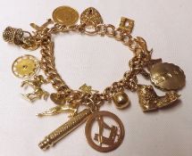 An early 20th Century hallmarked 15ct Gold hollow curb link Bracelet with engraved padlock and