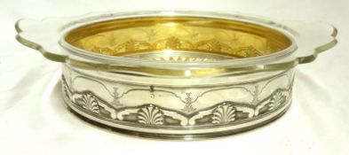 An unusual Serving Dish, clear glass double-handled bowl with removable Continental white metal