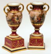A pair of Continental Double-Handled Urns, decorated with continuous central scene of classical