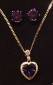 A white metal, Purple Amethyst and White Sapphire Heart Pendant with a pair of matching Earrings,