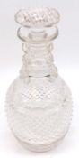 A 19th Century Clear Glass Decanter of bulbous form, decorated with cut hobnail type design and