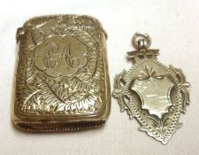 A Mixed Lot: a Victorian Vesta with fern engraved detail, Birmingham 1893; together with a further