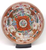 A Chinese Circular Charger, the centre painted in famille rose, verte, iron red etc with radiating