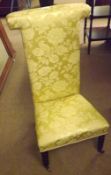 A 19th Century Prie Dieu Chair on bobbin turned front supports, upholstered in yellow floral pattern