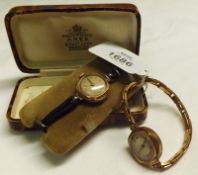 A Mixed Lot comprising:  A 9ct Gold Ladies Wrist Watch together with a further base metal example,