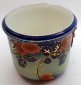 A Wilkinson Limited Oxford pattern Jardinière, decorated with flowers on a blue background, 9”