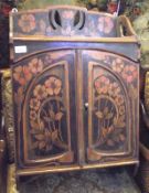 A small late 19th Century Double Door Wall Cabinet, decorated with painted design of Art Nouveau