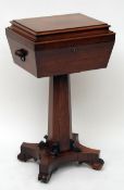 An early 19th Century Rosewood Teapoy, the rectangular hinged top opening to reveal a plush-lined