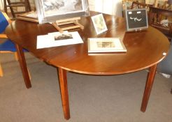 A Mahogany D-end Dining Table, raised on plain square moulded supports, extends to 77” including one