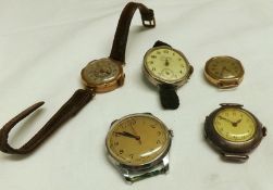 A Mixed Lot comprising:  Two various 9ct Gold Ladies Wrist Watches together with a Silver example