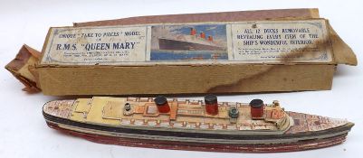 An unusual Cardboard Model of RMS Queen Mary, complete with original box in distressed condition,