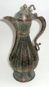 An unusual Middle Eastern Copper Coffee Pot, hinged lid, swept handle, body with ribbed detail and