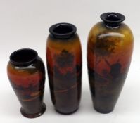 A group of three small Royal Doulton and Doulton Burslem Small Vases decorated with rural scenes