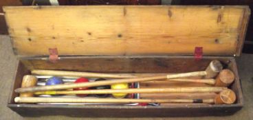 A Pine Cased Vintage Croquet Set, comprising four Mallets, case 40” long