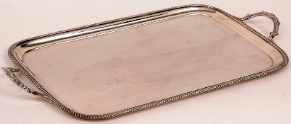 A George V Rectangular double-handled Tea Tray with gadrooned edge and plain centre 22” long, London