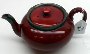 A Royal Doulton Flambé Teapot, with silver collar and silver pouring lip, (hairline crack to